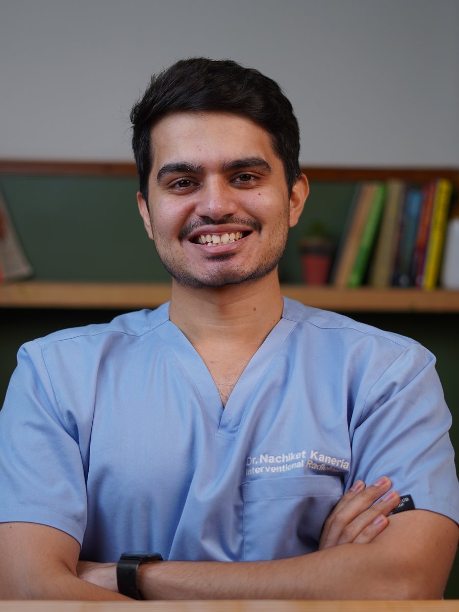 Dr Nachiket Kaneria in blue scrubs